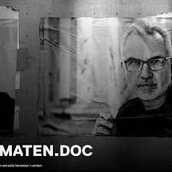 Афіша з партрэтам Альгерда Бахарэвіча